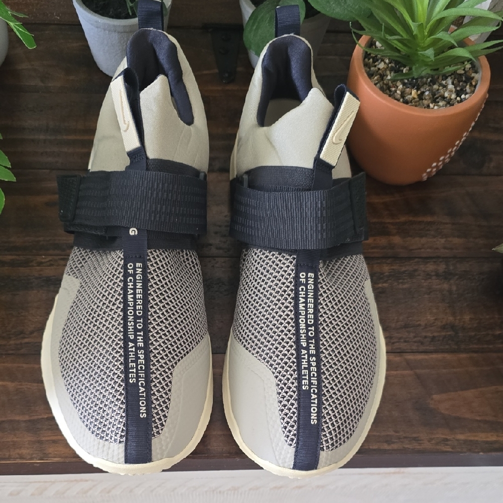 Nike Cream and Black Athletic Shoes with Modern Slip-On Design